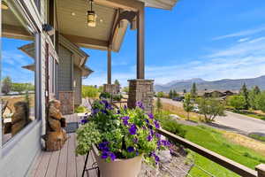 Balcony featuring a mountain view of Snowbasin and Pineview