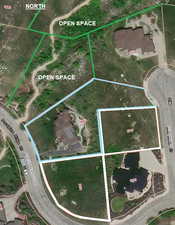Aerial map of property and surrounding area with property parcel outlined