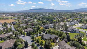 Aerial view of residential area featuring mountains
