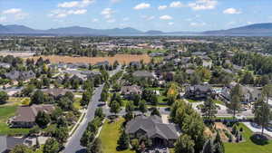 Aerial view of residential area with a mountainous background