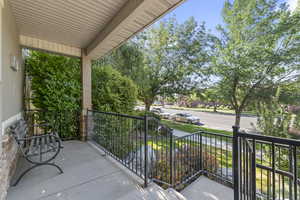 View of covered porch. One of the only units featuring a porch.