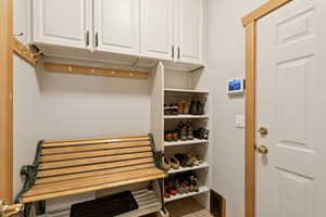 Mudroom featuring light tile patterned floors