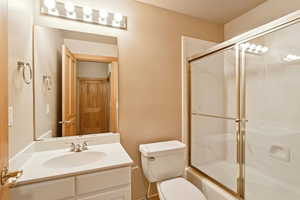 Full bath with vanity and toilet