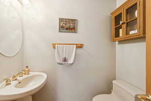 Bathroom featuring toilet and a sink