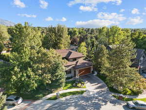 View of subject property featuring a heavily wooded area