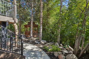 View of yard with a gazebo and stairs