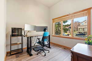 Office area featuring light wood-type flooring