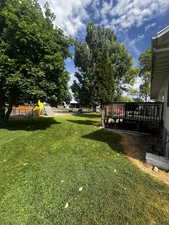 View of yard featuring a deck