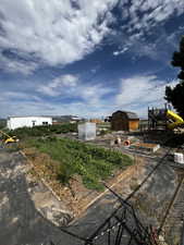 View of yard with a shed and a playground
