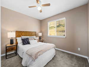 2 of 2 bedrooms on main floor. 2nd primary bedroom with ensuite bathroom. Gorgeous mountain views!