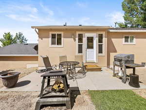 Rear view of property with patio