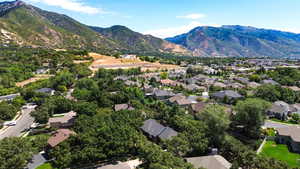 Aerial perspective of suburban area with mountains