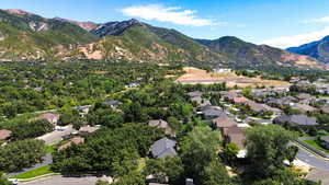 Aerial view of residential area with mountains