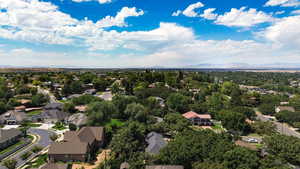 Aerial view of residential area featuring mountains