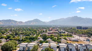 Aerial perspective of suburban area with mountains