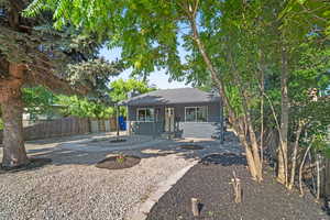 Bungalow-style home featuring a chimney