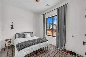 Bedroom with baseboards