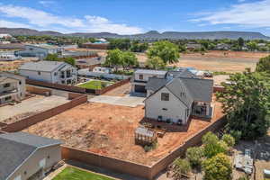 Aerial view of residential area with a mountain backdrop