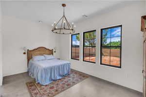Bedroom with a chandelier