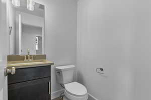 Bathroom with vanity and toilet