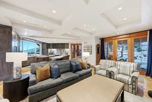 Living room featuring light wood-style floors and recessed lighting