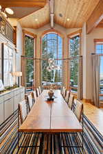 Dining area featuring a chandelier, recessed lighting, and hardwood / wood-style floors