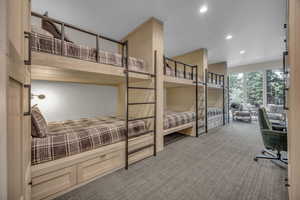 Bedroom with carpet floors and recessed lighting