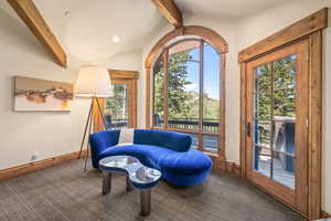 Sitting room with carpet floors and recessed lighting