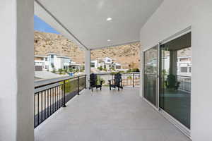 Balcony with a mountain view and a residential view