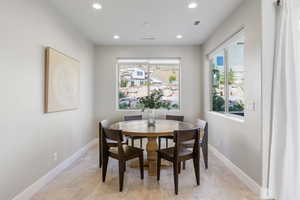 Dining area with recessed lighting