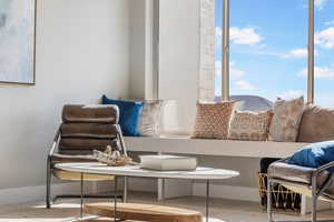 Living area featuring baseboards