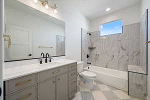 Full bath with washtub / shower combination and vanity