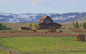 View of mountain backdrop featuring rural landscape