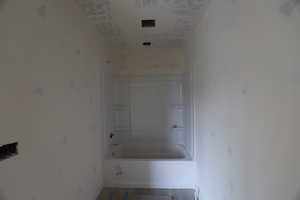 Full bathroom with shower / tub combination