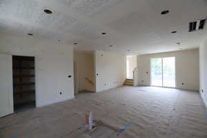 Unfurnished room featuring baseboards