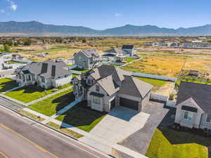 Aerial view of residential area featuring mountains