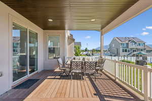 Large deck with outdoor lounge area and unobstructed views of the mountains