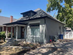 View of front of house featuring covered porch