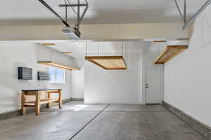 Garage featuring a garage door opener
