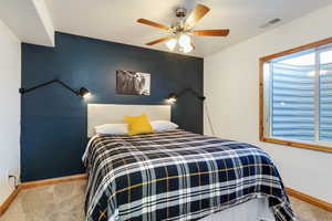 Bedroom featuring carpet floors and ceiling fan