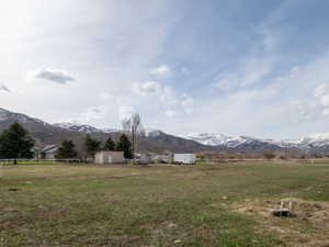 View of yard with a mountain view and a view of countryside