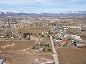 View of property location featuring a water and mountain view