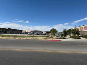 North view road featuring sidewalks and curbs