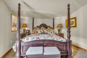 Bedroom featuring baseboards