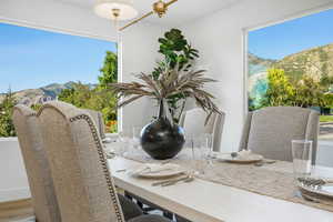 Dining room featuring a mountain view
