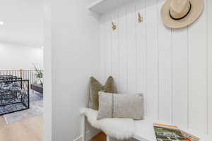 Mudroom featuring wood finished floors