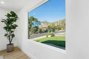 Interior space with mountains and wood finished floors
