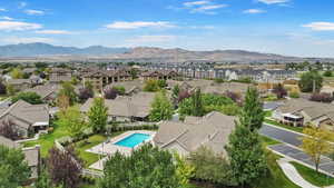 Drone / aerial view of mountains and a pool area