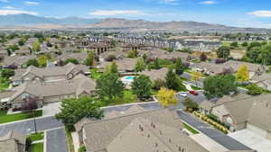 Aerial perspective of suburban area with a mountain backdrop