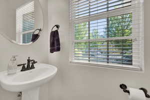 Half bathroom featuring a sink